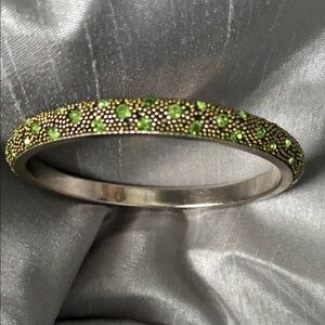 Vintage silver tone bracelet with green crystal stone studded accents